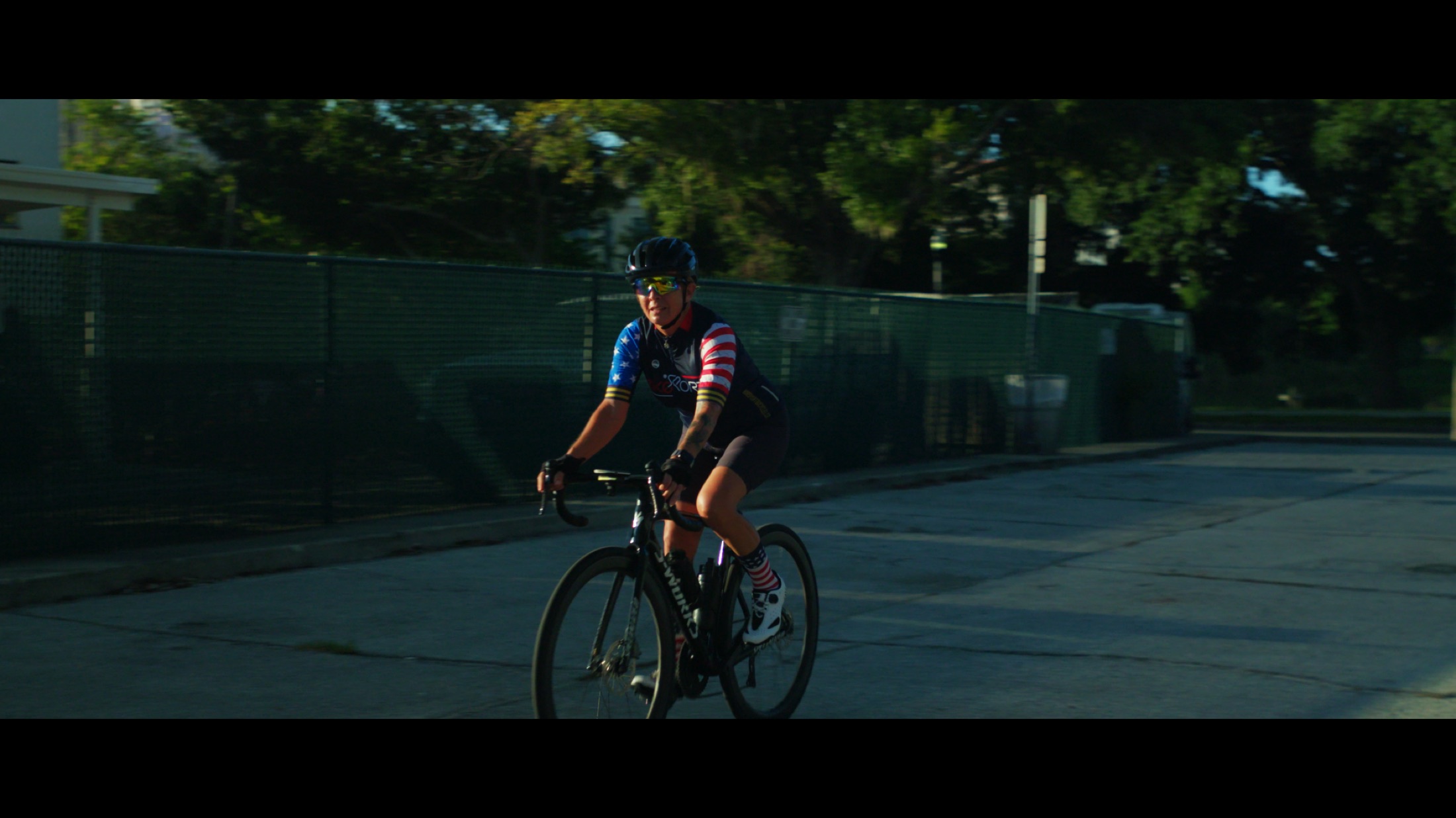 Cyclists share the lane while riding in formation.