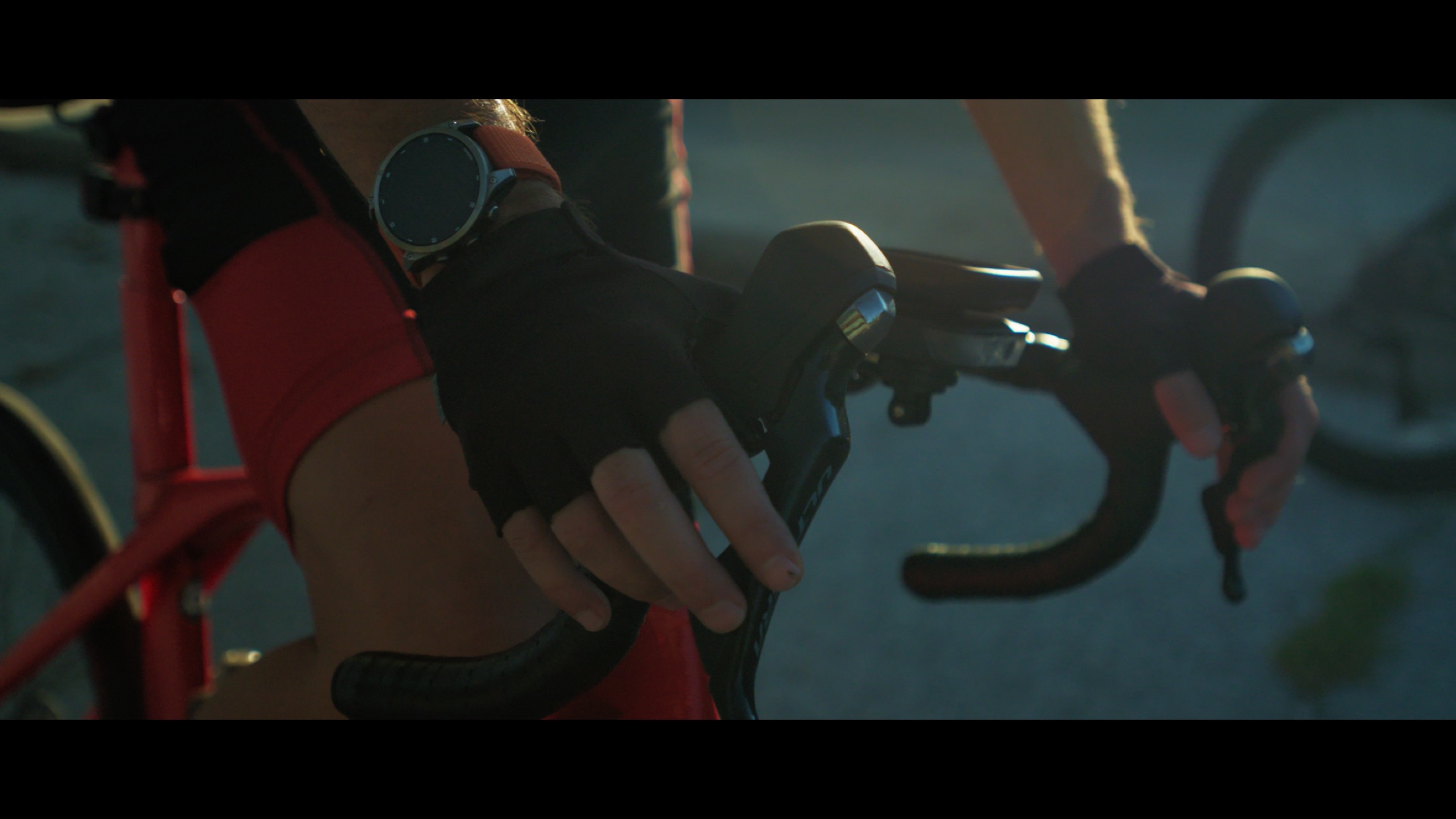 A rider checks the road ahead during a community ride.