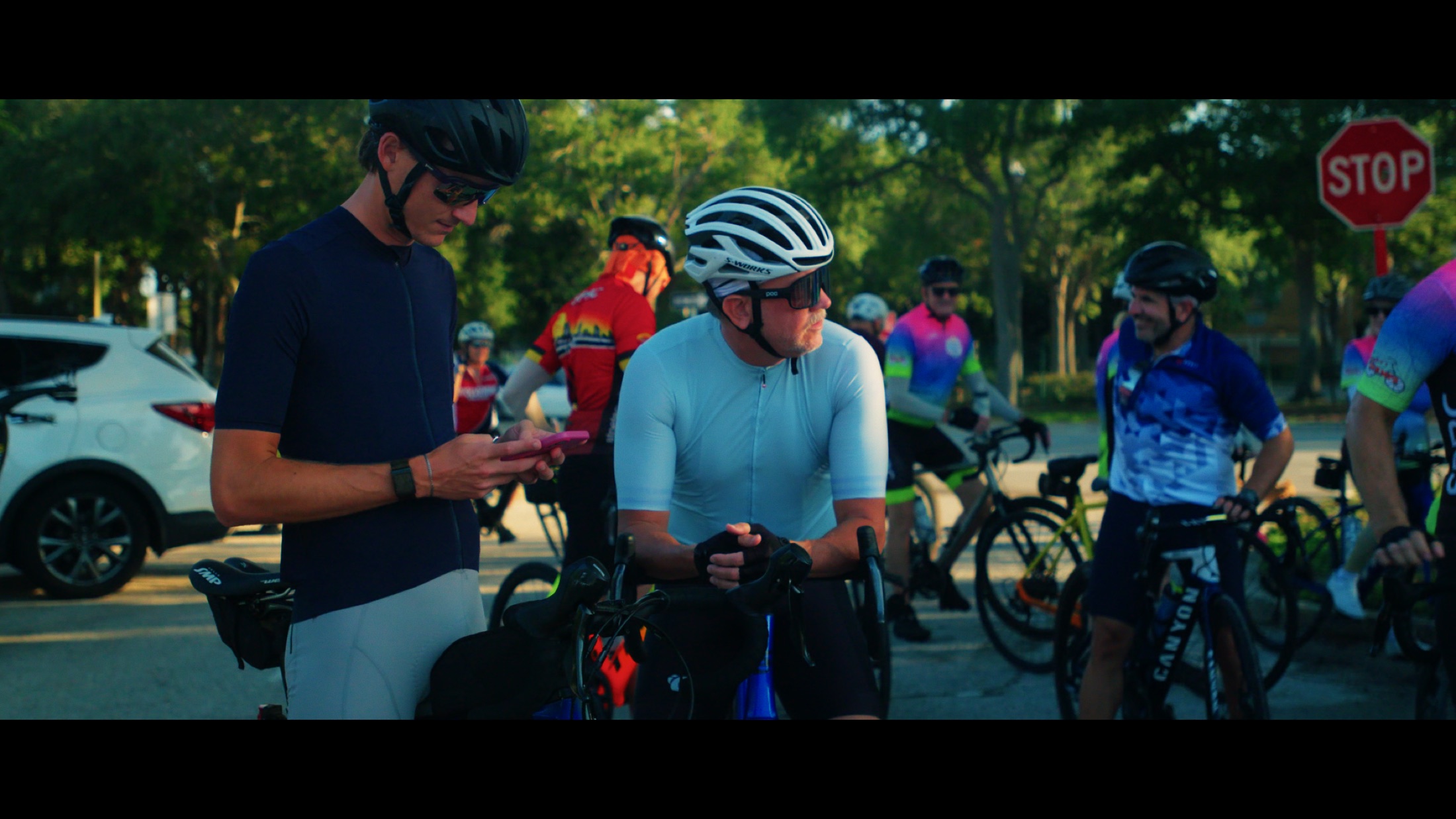 A cyclist rides past neighborhood streets in Florida.